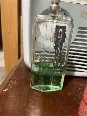Kenneth Cole Clear Glass Cologne Bottle with Green Liquid